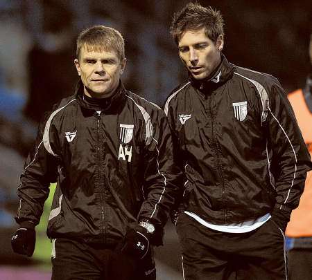 Andy Hessenthaler and Nicky Southall leave the field