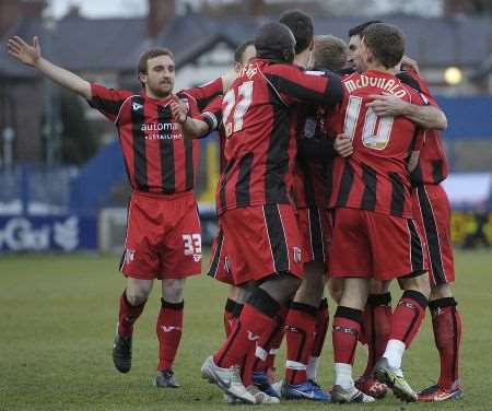 Gillingham players celebrate a goal during the 4-2 win at Macclesfield. Dec 11 2010.
