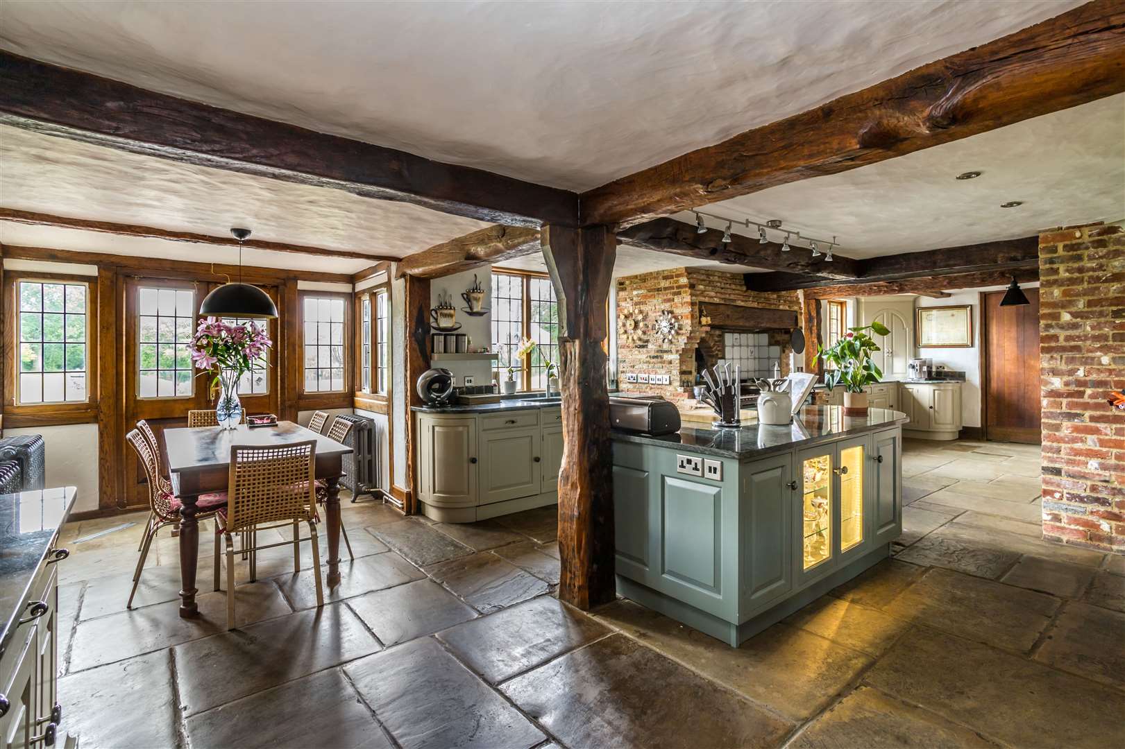 Beams, an aga, island and wine fridge in the kitchen Picture: Hamptons