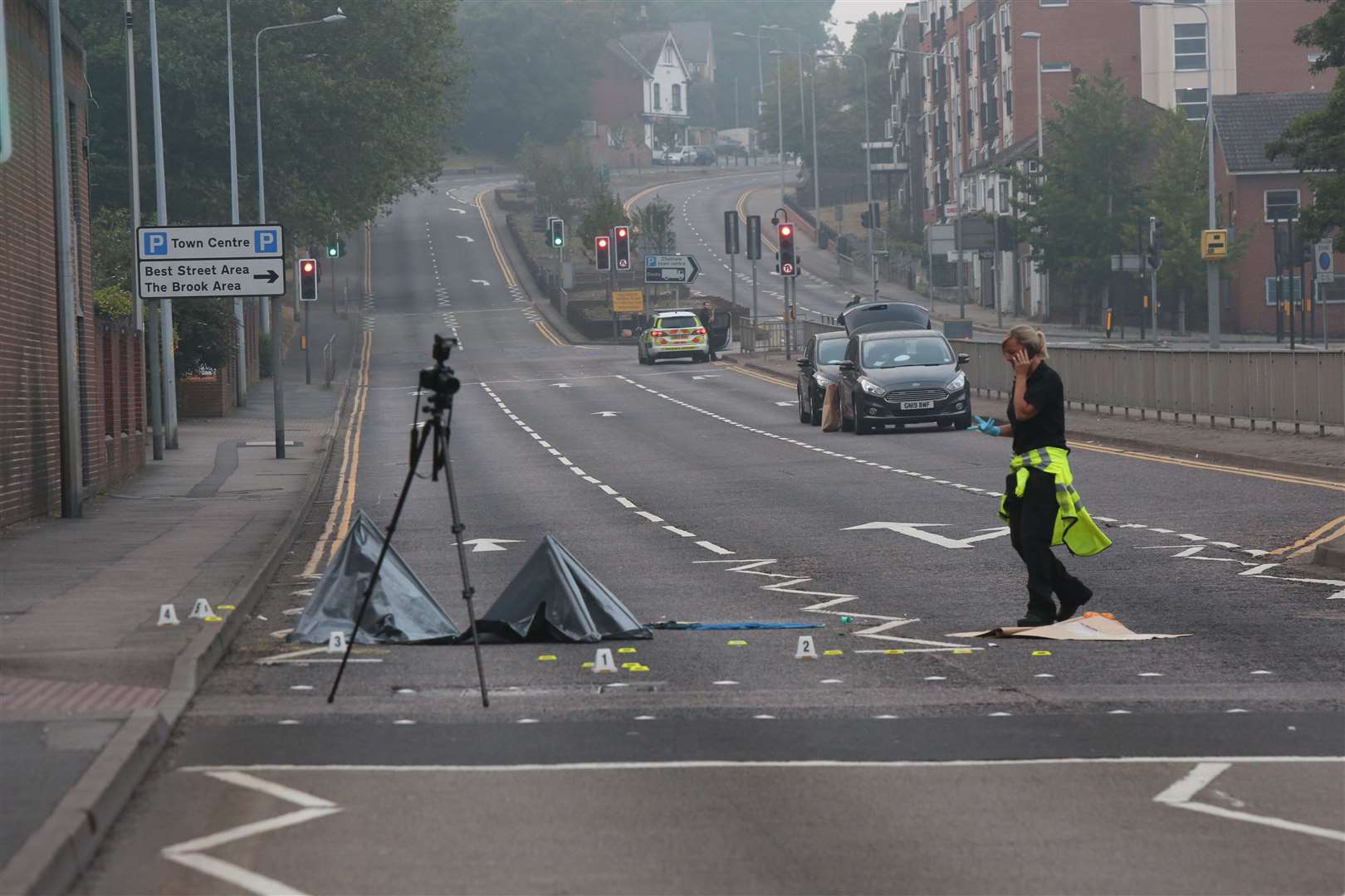 Police at the scene of the hit and run in New Road, Chatham. Images: UKNiP