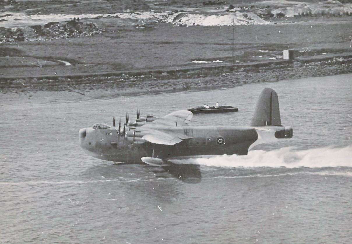 A Sunderland flying boat taking off from the Medway
