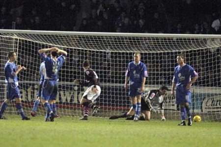 DESPAIR: Gillingham's players are distraught as Northampton equalise. Picture: ANDY PAYTON