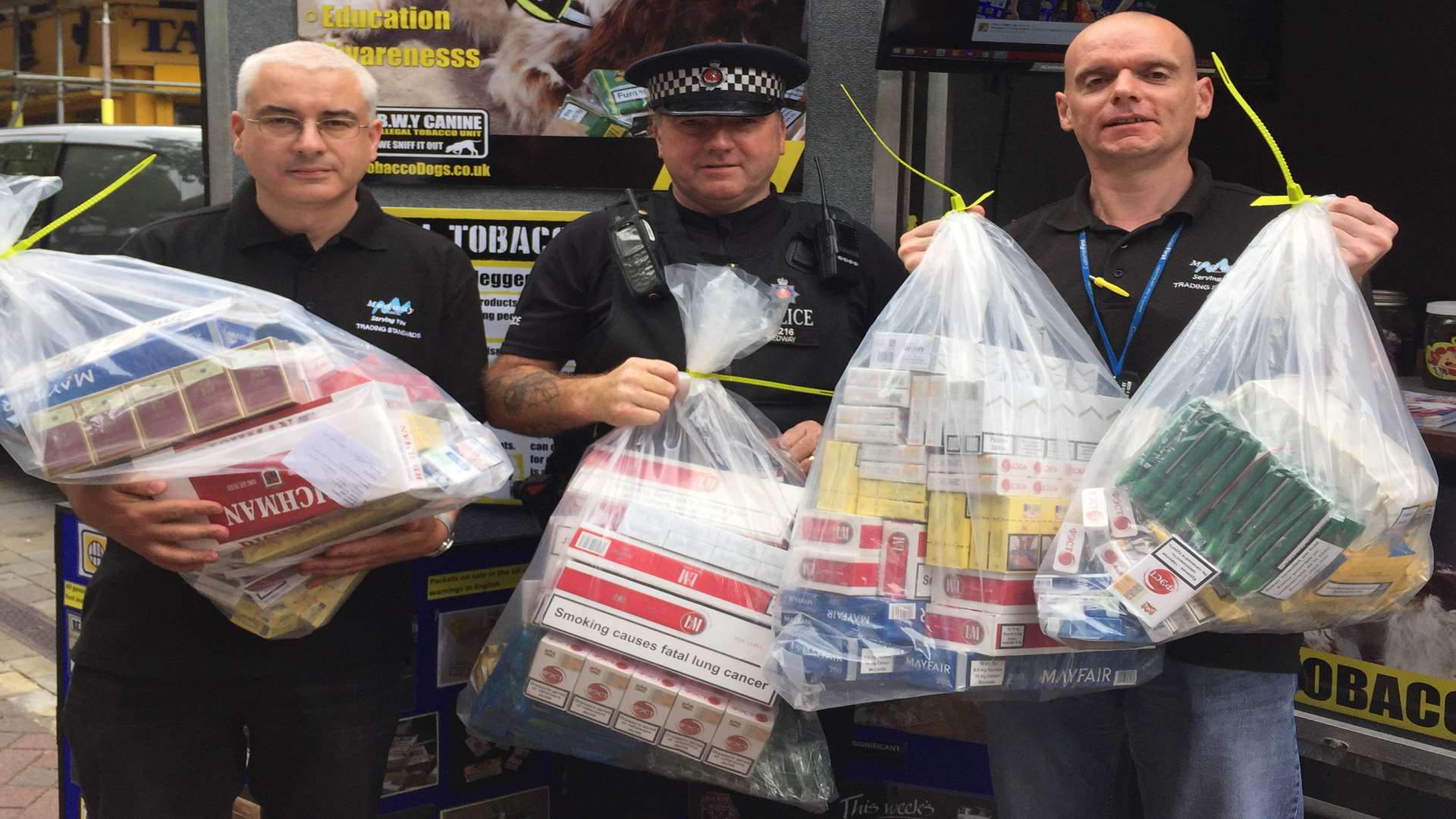 Ian Gilmore from Trading Standards (left) and PC Paul Riley (middle), with another Trading Standards officer