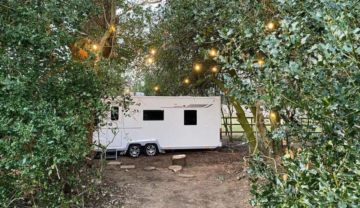 This cosy caravan is tucked away in the woods for a truly secluded mini-break. Picture: Booking.com