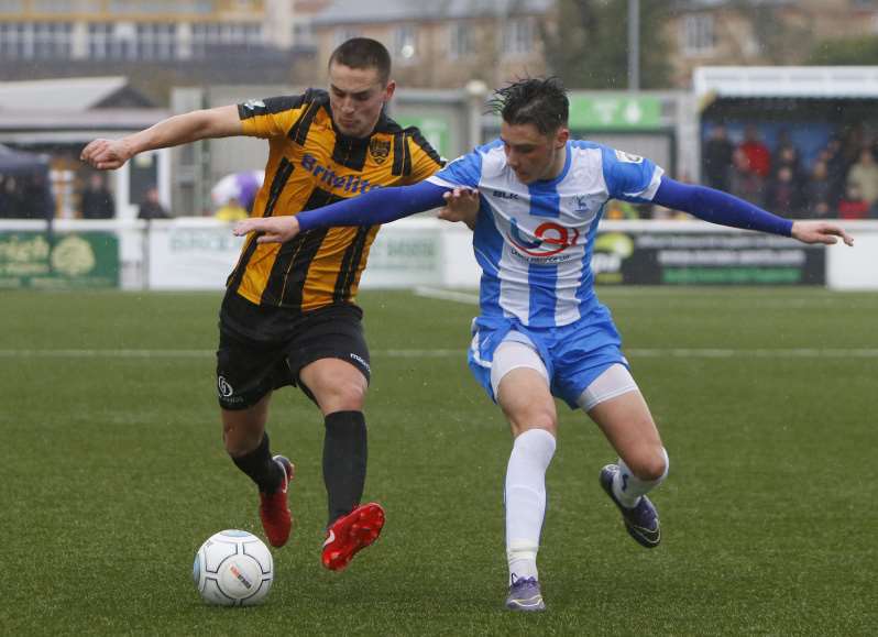 Maidstone wing-back Josh Hare battles for possession Picture: Andy Jones