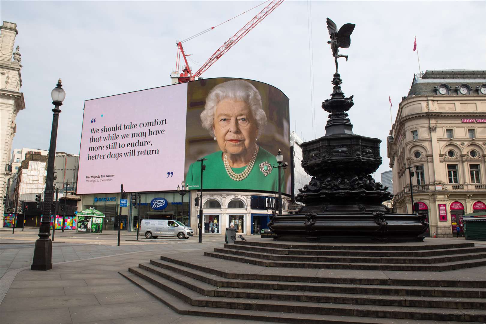 Quiet streets as the Queen’s image goes up in lights at Piccadilly Circus (Dominic Lipinski/PA)