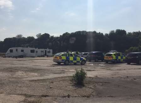 Police at the site of a travellers' camp in Rosherville Way, Northfleet