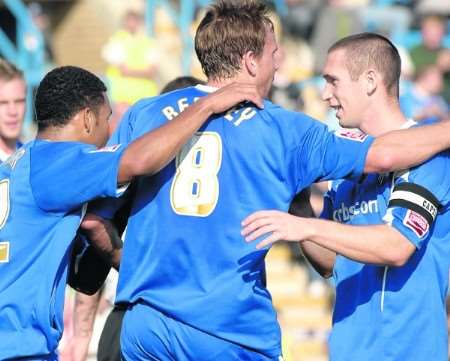Andy Barcham (left), Mark Bentley and Andrew Crofts celebrate the only goal. Picture: Grant Falvey