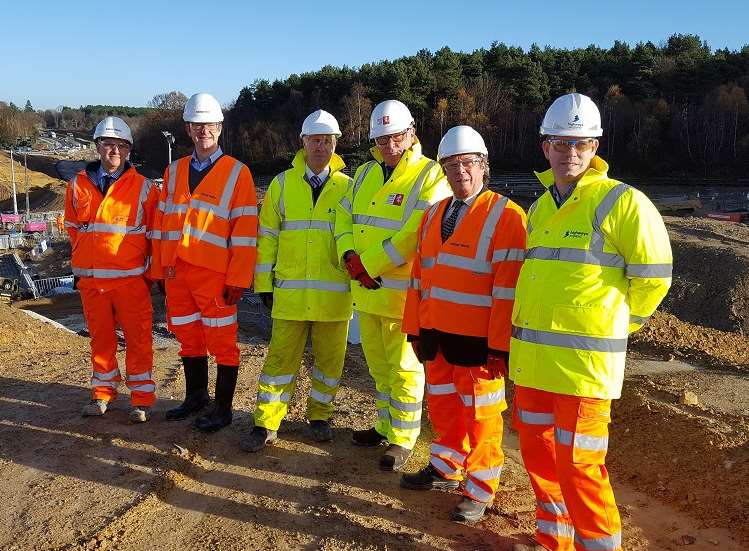 Greg Clark MP with councillors and Highways England staff at the site
