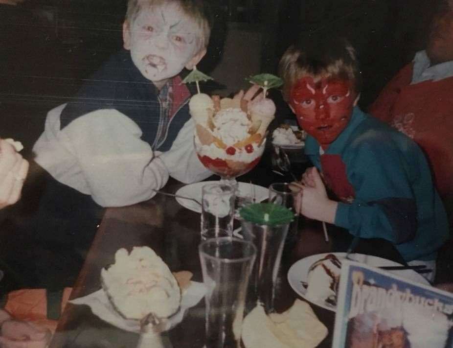 Caroline Perkin's sons Daniel (left) and Ryan (right) at Brandybucks, Cliftonville, about to tuck into one of the huge desserts. A branded menu can be seen in the bottom right. Picture: Caroline Perkins