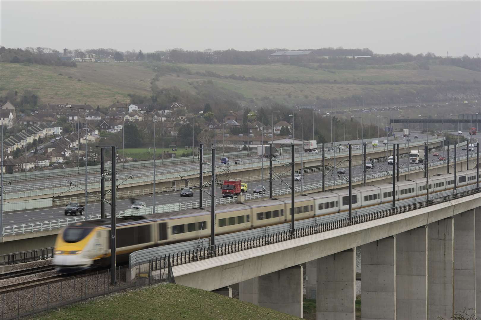 A Eurostar train crosses the Medway Valley bridge at Strood