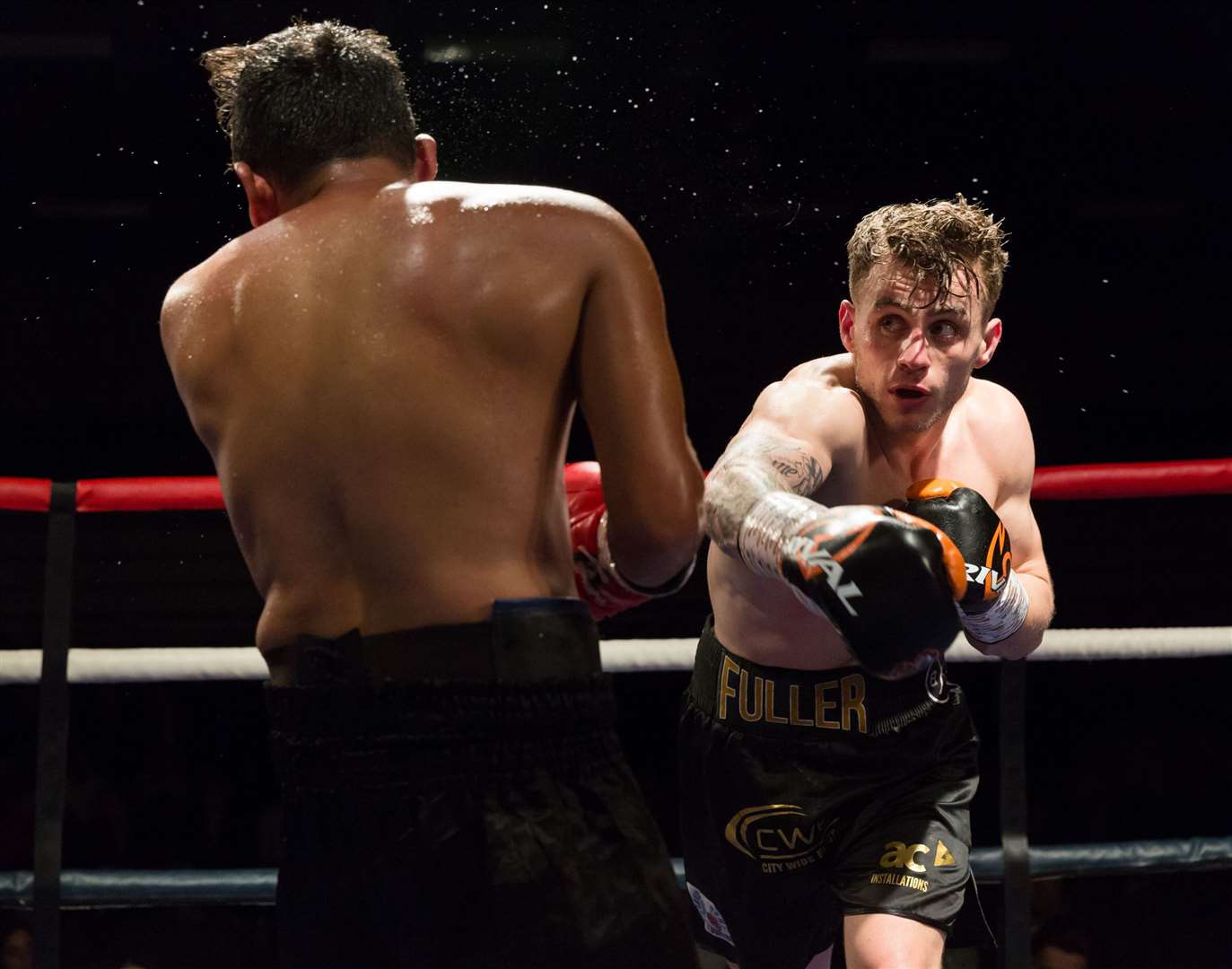 Lenny Fuller, right, fights at the Kent County Showground in Detling on May 7 Picture: Countrywide Photographic