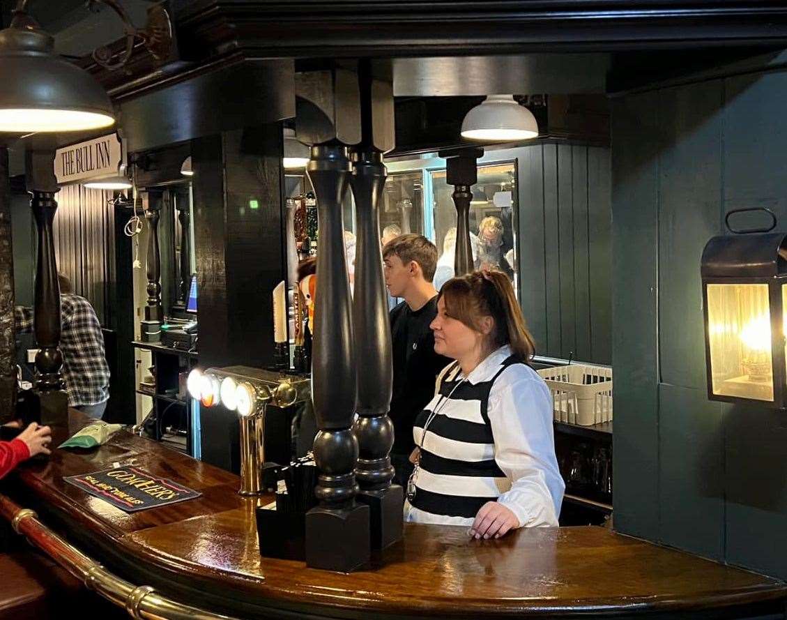 Staff manning the bar on Saturday. Picture: Bull Inn