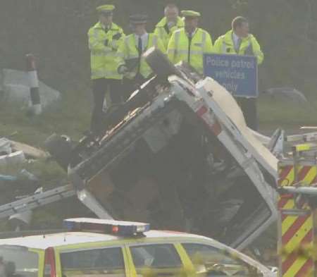 TRIPLE TRAGEDY: The overturned van in which three people died. Picture: PAUL DENNIS
