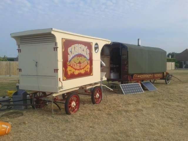 The baker's wagon and caravan set up at one of Mr Sanger's shows