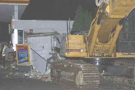 The digger at the scene of the raid. Picture: KEITH THOMPSON