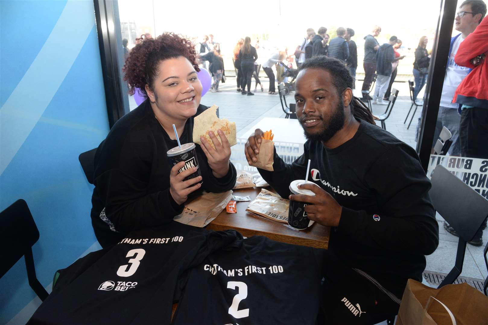 Lilly Crawford and Dylan Williams were the 3rd and 2nd customers at the opening of the Taco Bell at The Quays, Dock Head Road, St Mary's Island, Chatham on Wednesday. Picture: Chris Davey..... (10357990)