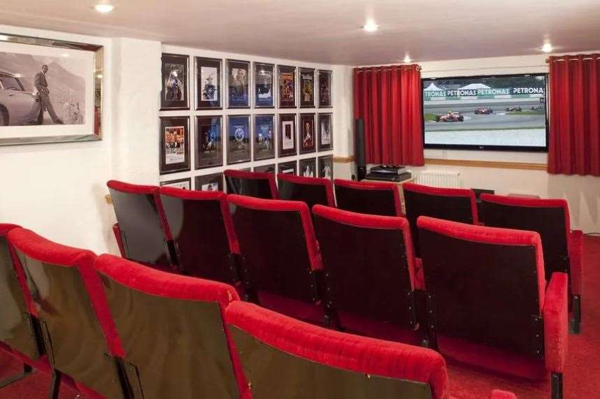 Enjoy the big screen at home with your own cinema room at this Edenbridge country home. Picture: Jackson-Stops