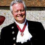 Chartered surveyor Mike Bax, pictured with his wife Jane, has been appointed High Sheriff of Kent