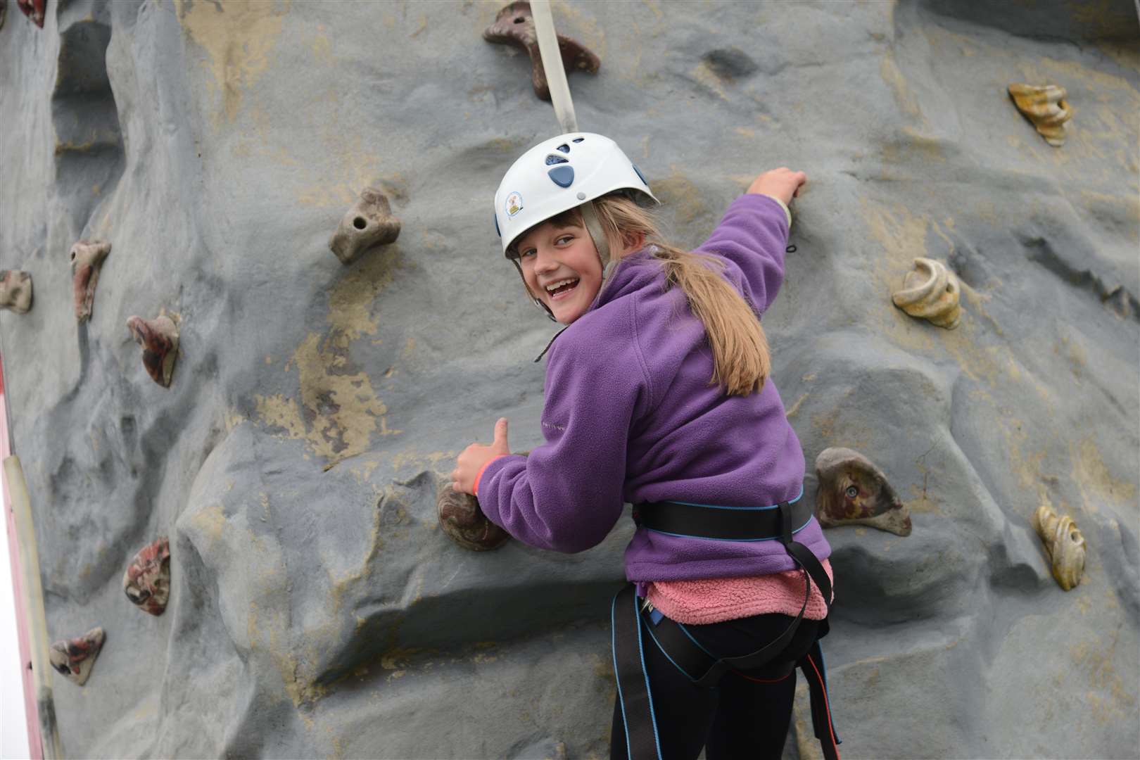 Katya Betts on the KM and Scouts' climbing wall
