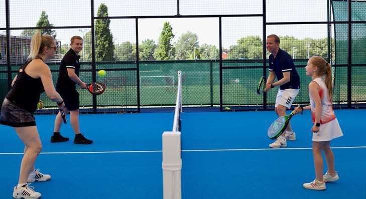 Padel is a mix of tennis and squash and can be played by all the family. Photo: Stock