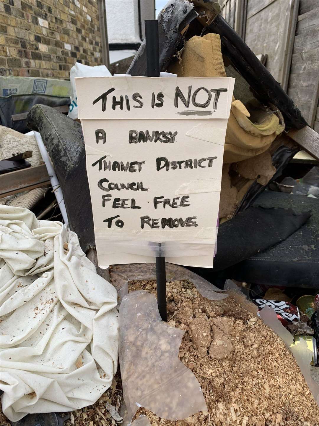 The comical sign was added after Thanet District Council removed the freezer