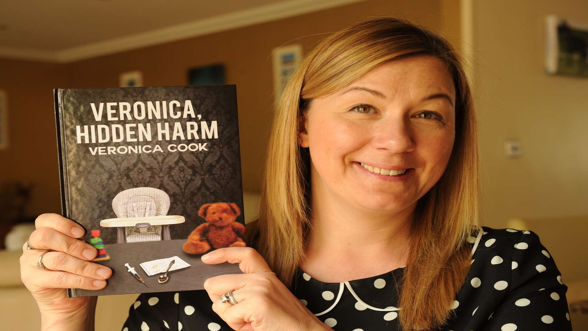 Veronica Cook with her book