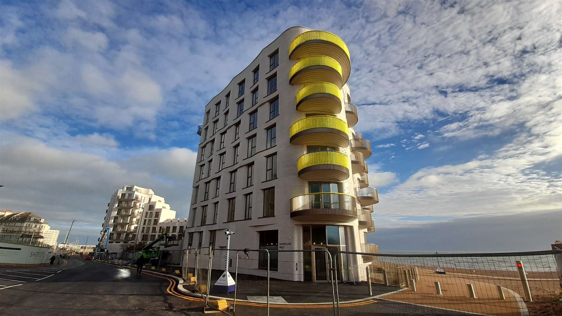 Bosses at FHSDC say the yellow balconies are only 'temporary' while building work continues