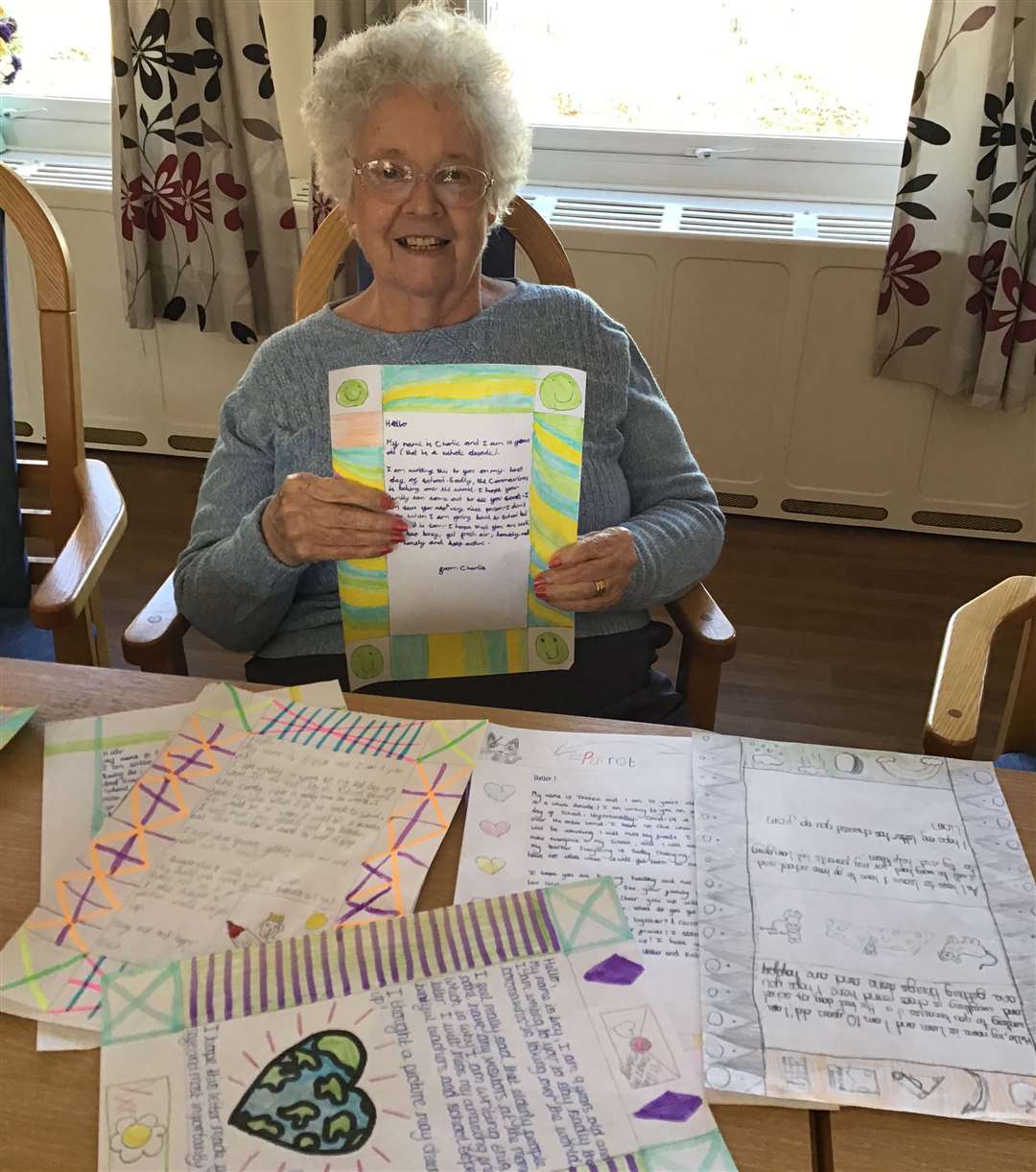 Jean with her letters at Edward Moore House Residential Care Home in Gravesend