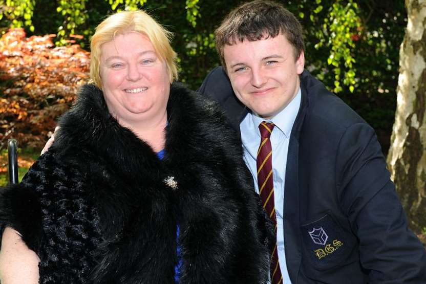Debbie Stiff with pupil Sam Hubbard, who helped her when she had a fall