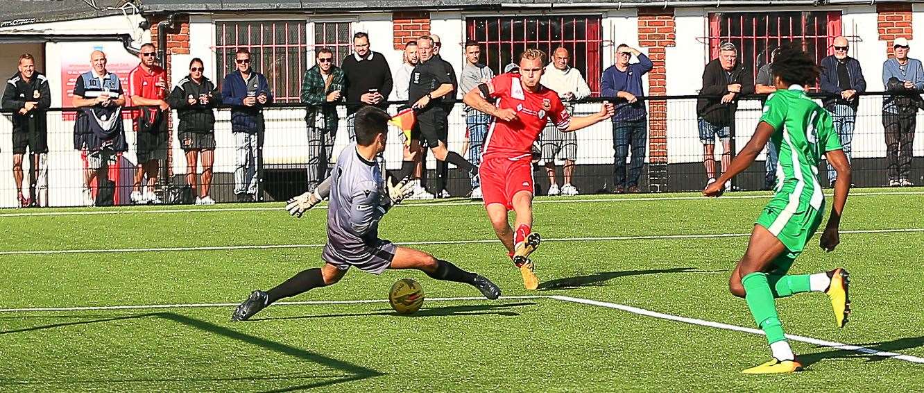 Whitstable's James Jeffrey scores in their win against Rusthall. Picture: Les Biggs