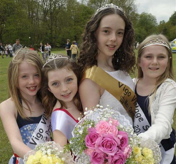 Riley Murphy, 8, Sophie Parry-Knight, 8, May Queen Emily Broadfoot, 11, and Maya Walpole, 10.