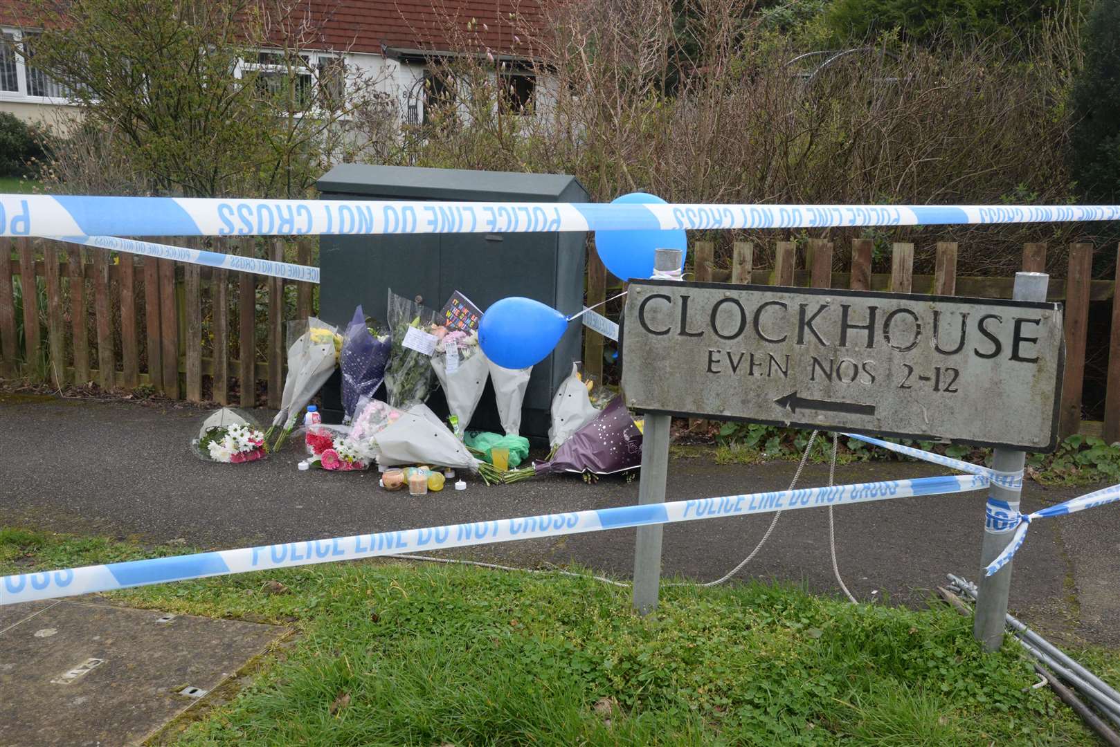 Floral tributes have been left at the scene in Ashford. Picture: Chris Davey