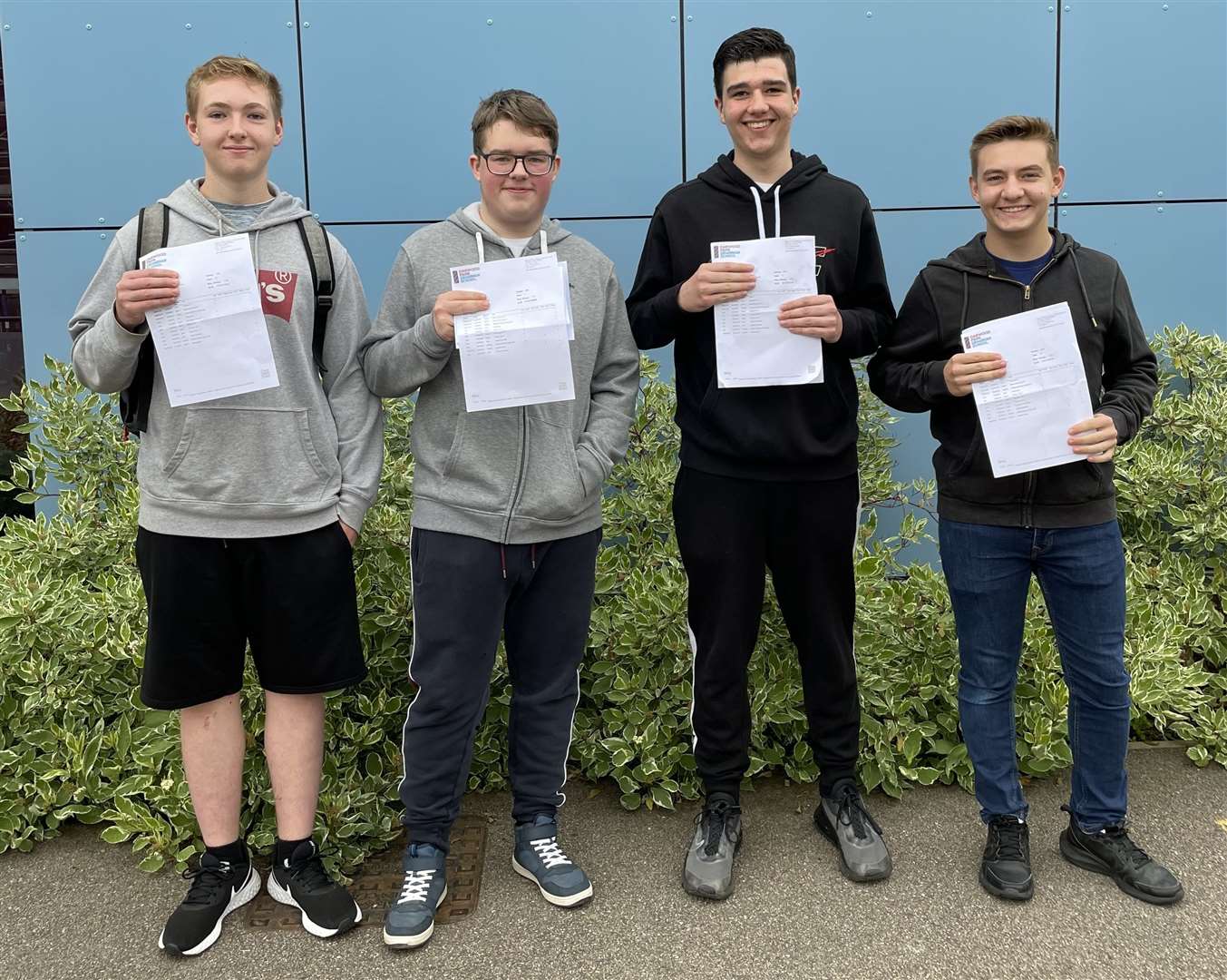 Saull John, Jack Wilson, Christian Woodward and George Brown from Oakwood Park Grammar School celebrating on GCSE results day