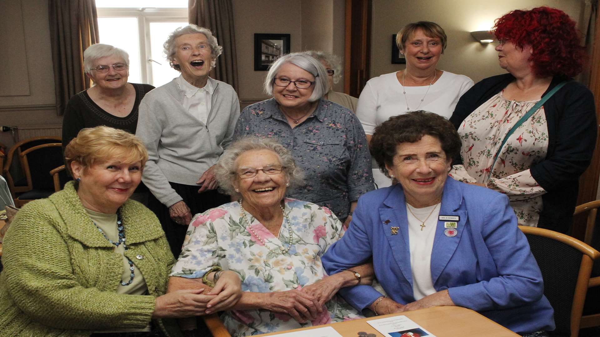 Alice, centre, with some of the other ladies from the WI, and Brenda Roberts, right, Ex- President of the WI and long-life best friend.