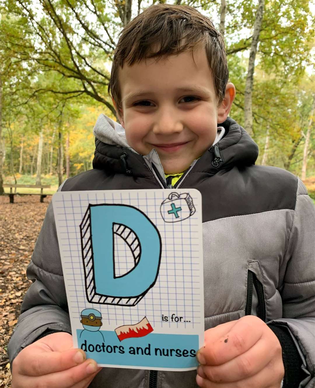 Nic's son Dylan, 5, with one of the flash cards