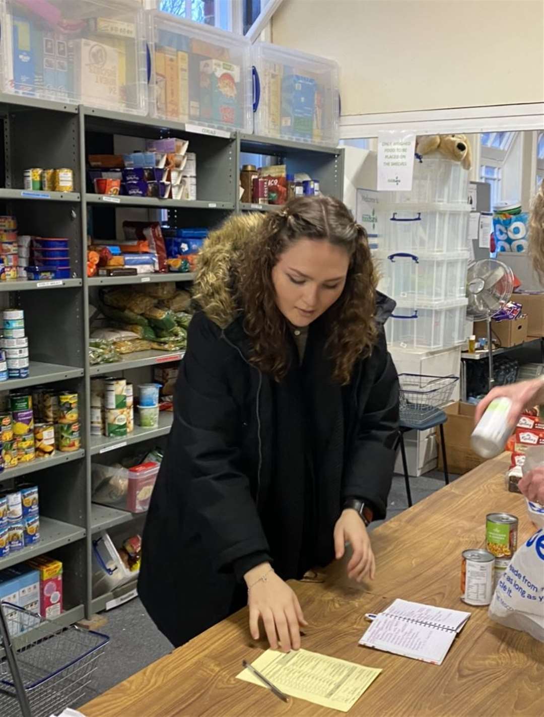 Megan Carr helping at Faversham Foodbank