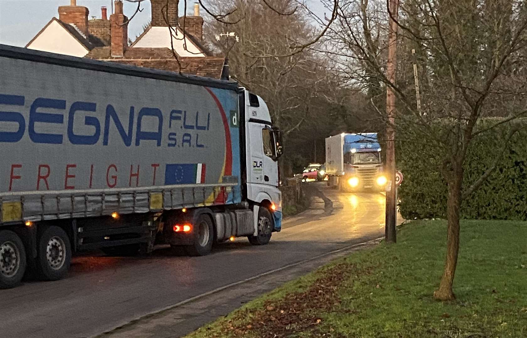 Just two of the lorries in Mersham last week after truckers were given the wrong postcode. Picture: Stewart Ross