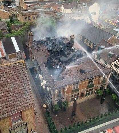 Fire crews tackling the blaze at Mu Mu in Maidstone's Week Street from above Picture: Petra Kovacsova