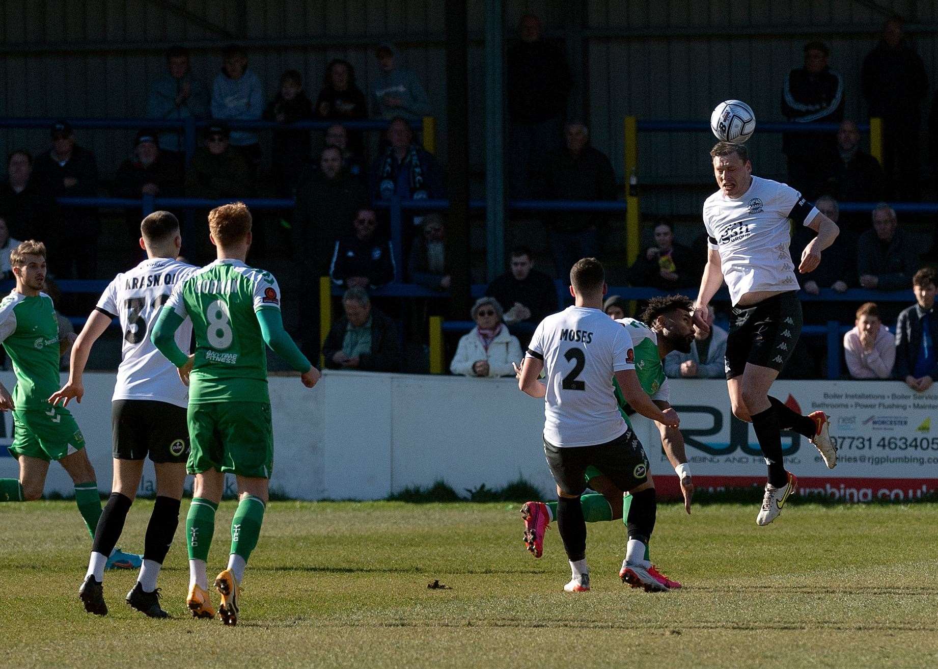 Dover captain Jake Goodman wins a header during their defeat to Yeovil. Picture: Stuart Brock