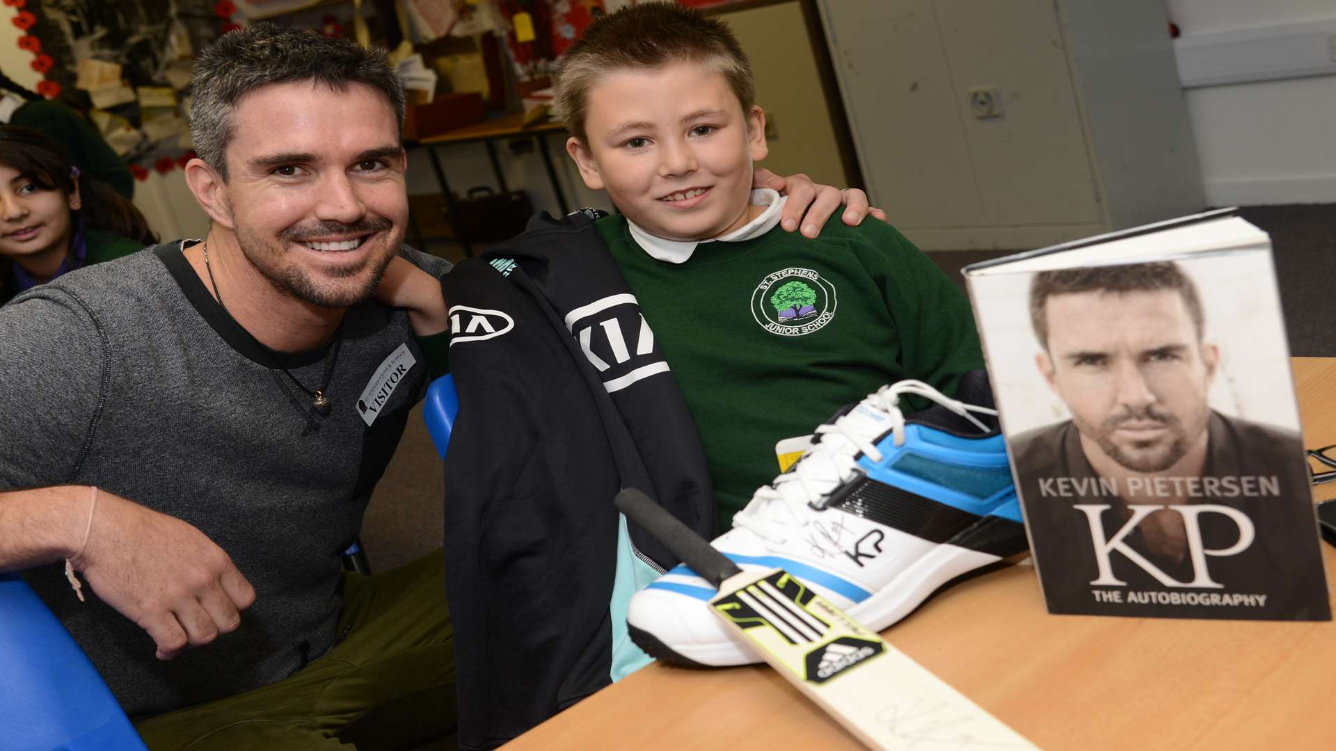 Kevin Pietersen surprises Ryan Belsey in class at St Stephen's Junior School in Canterbury