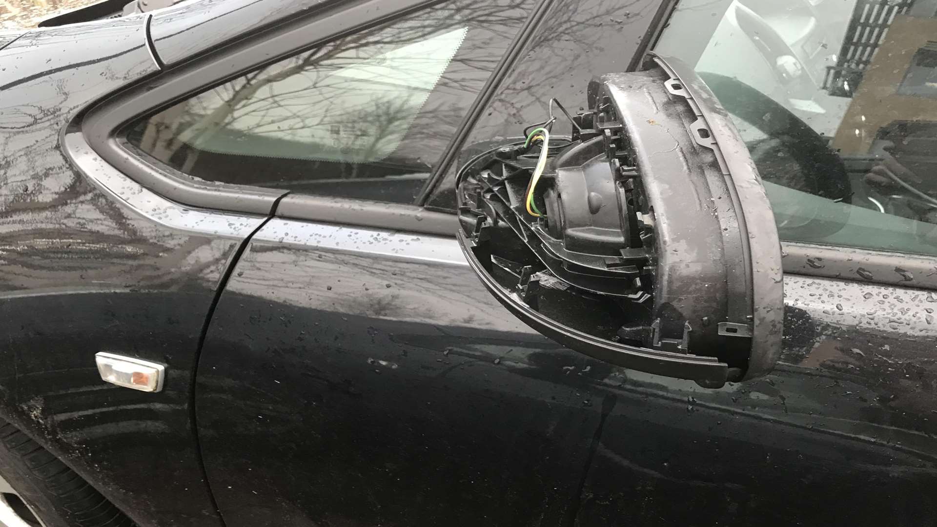 Damage to the car's wing mirror made moving the car more difficult