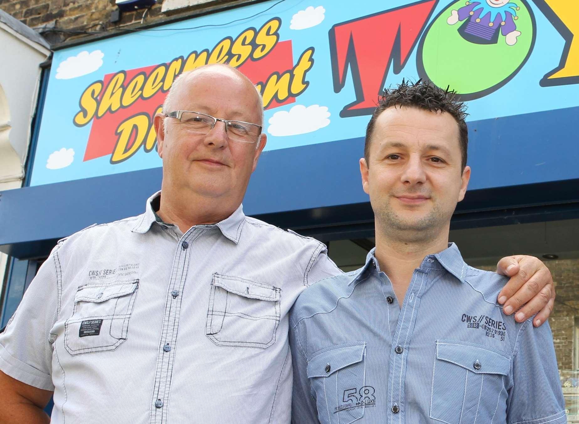 Nathan Hill, pictured with his father David, outside Sheerness Discount Toy Store. File photo.