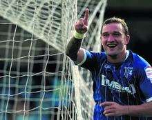 Danny Kedwell celebrates his second goal against Burton Albion in Gillingham's 3-1 home win