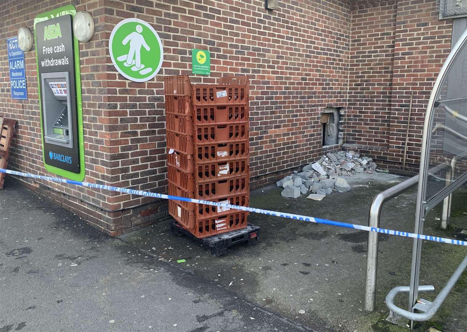 Police taped off the area around the cash machine outside Asda in Strood