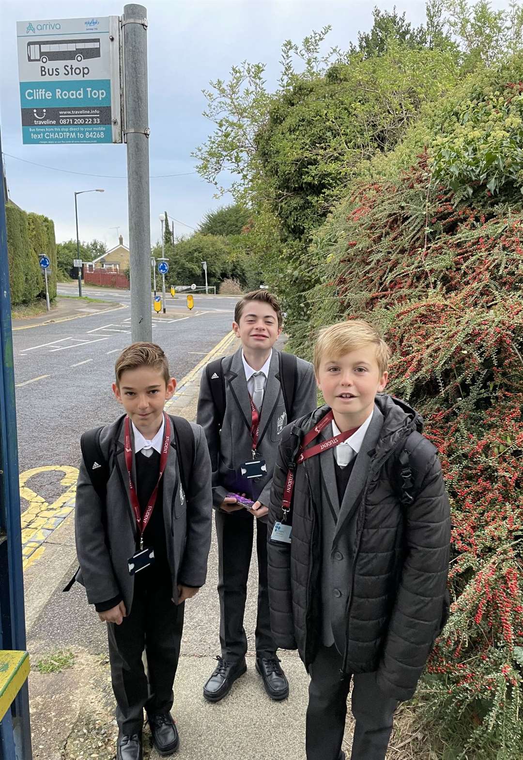 Waiting for bus at Frindsbury (from left) Ellis Arrowsmith, Noah Dodds and Flynn Burke