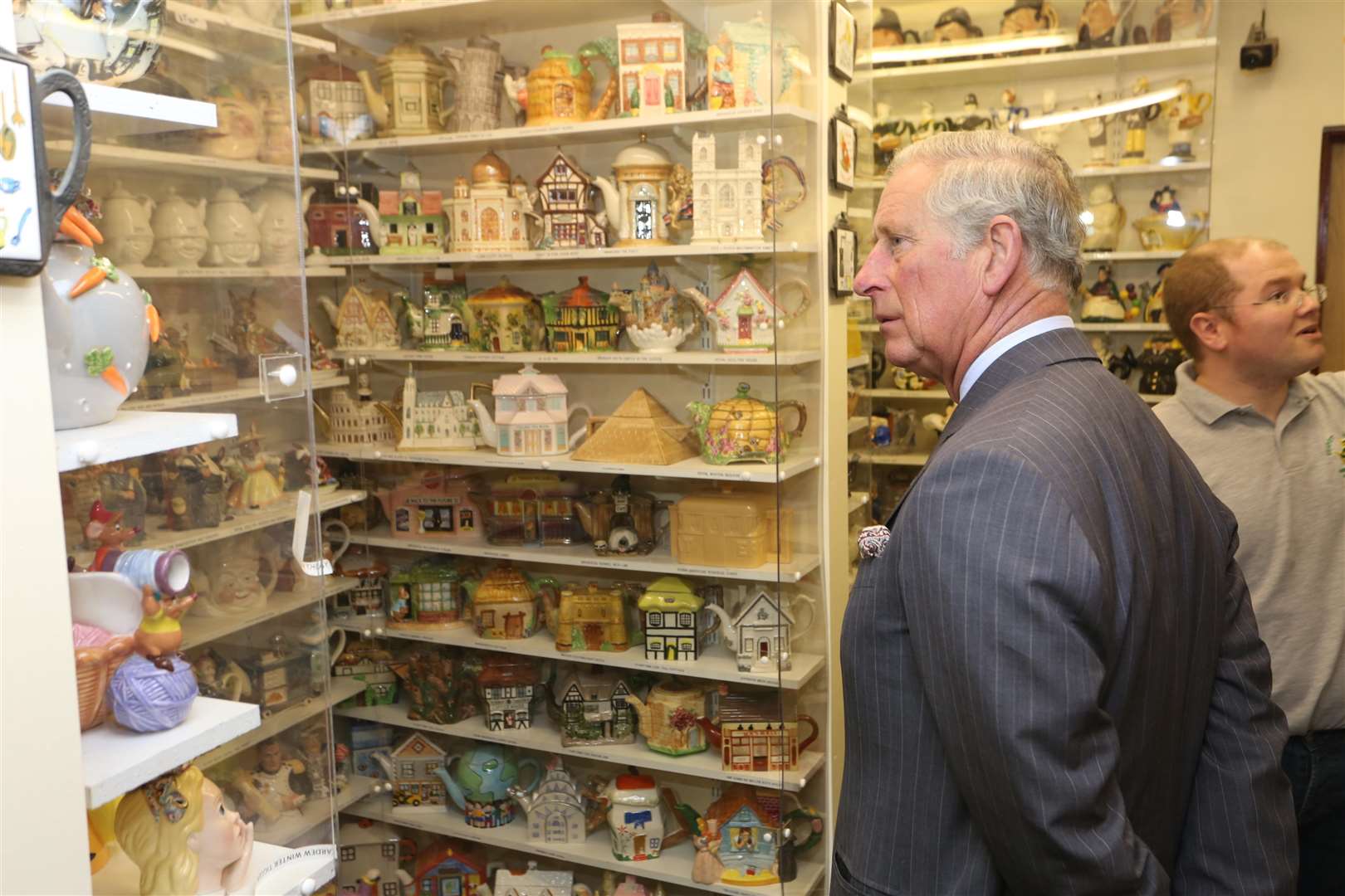 HRH Prince of Wales looks at tea pots in Teapot Island. Picture: Martin Apps