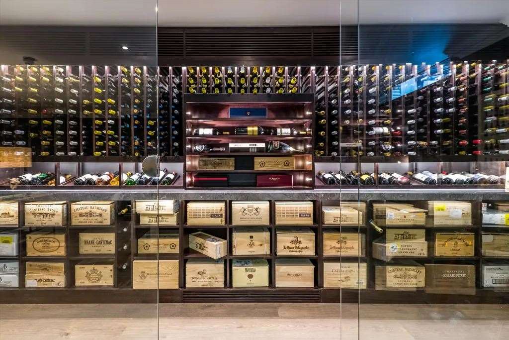 The spectacular wine cellar can hold a surprising number of bottles. Picture: Knight Frank