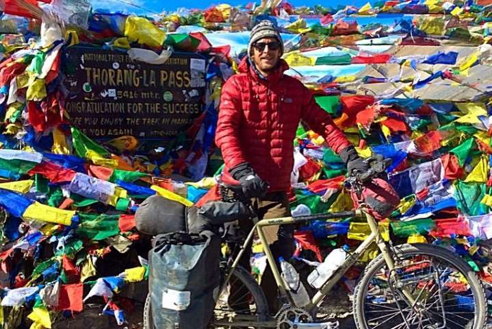 Sam is cycling solo across the world