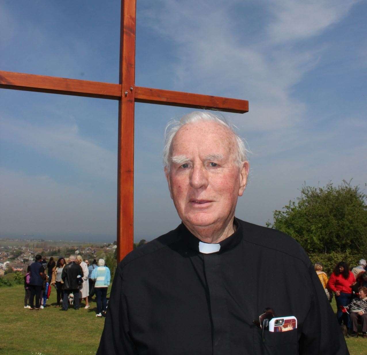 Father Frank Moran at the Easter Good Friday service at Bunny Bank at The Glen, Minster, Sheppey, in 2019 with the traditional three wooden crosses